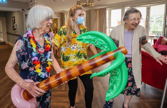 Great Oaks care home residents in Bournemouth enjoying a Hawaiian party to celebrate the summer months.