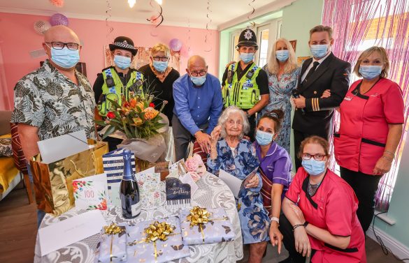 Fairmile Grange Care Home resident in Christchurch celebrating her 100th birthday with family, friends, carers and Dorset police officers